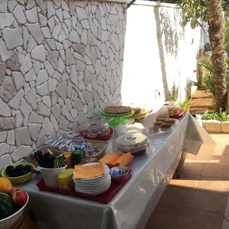 Guest house “angel Bay Punta Prosciutto” Is Located In The Heart Of